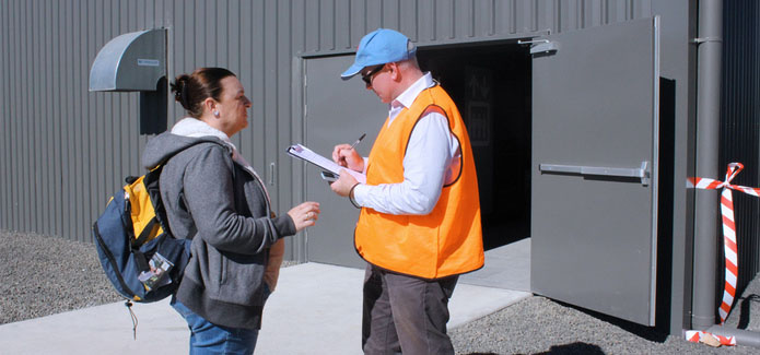 Sydney Metro workers engaging with customers on site