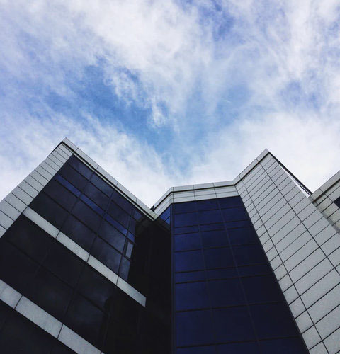 View of a high-rise office block from below to show scaling CX