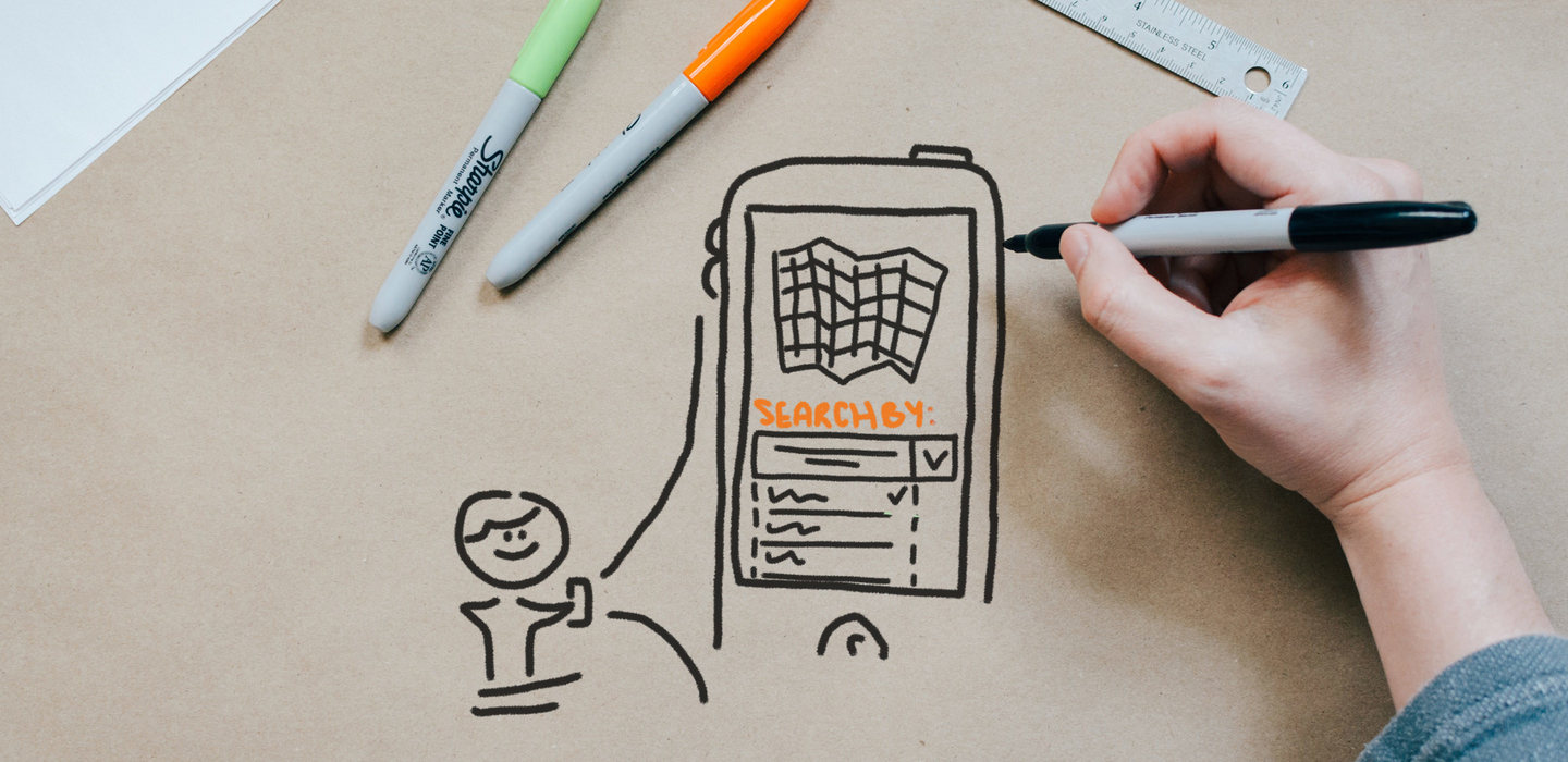 Proto experience designer sketching new search function idea via mobile